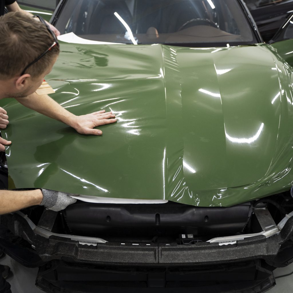 person working car wrapping